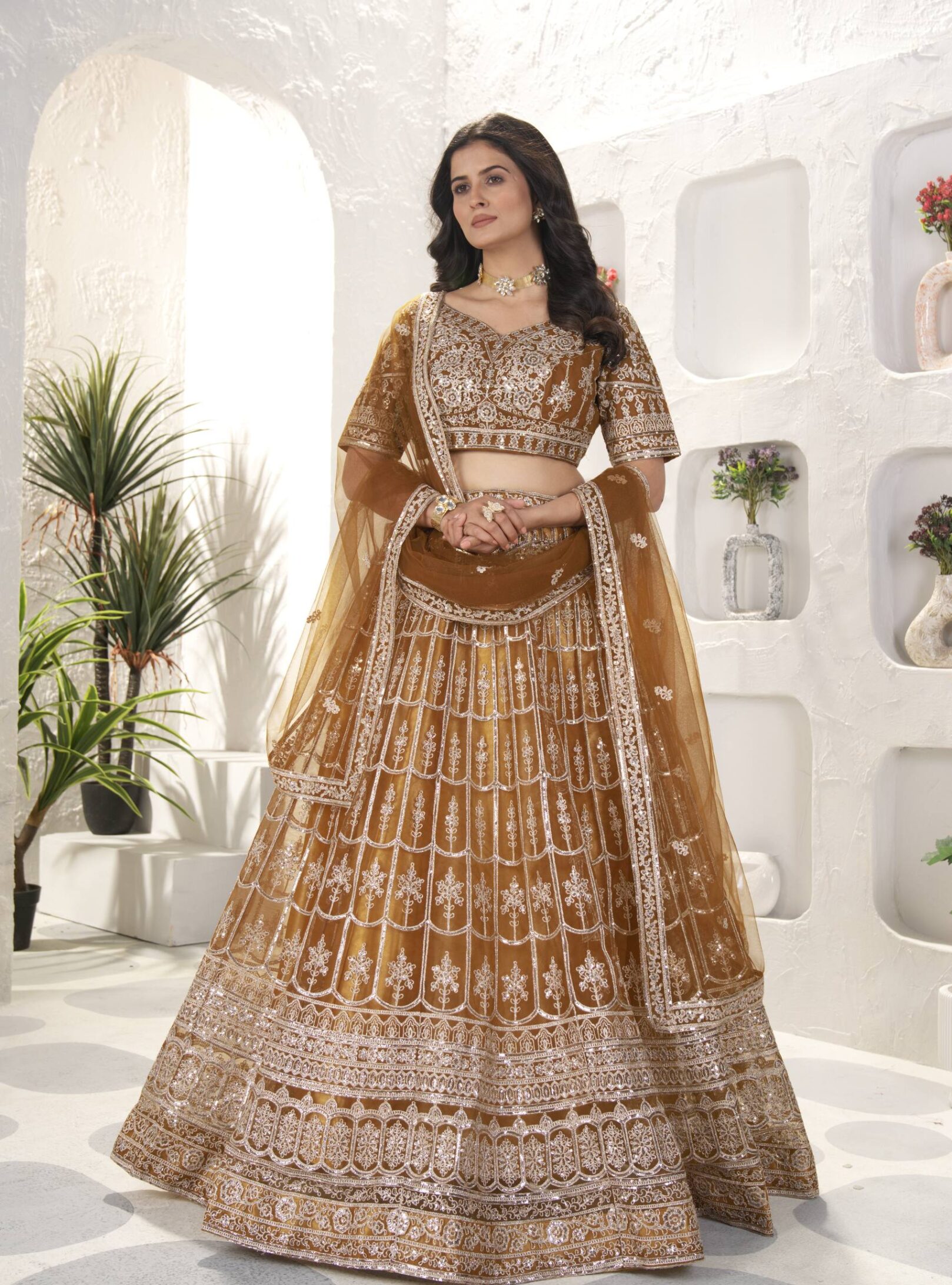 photo_1_2026-03-15_16-54-55 Designer Brown Net Lehenga Choli with Zari & Sequins Embroidery – Wedding Party Wear | RjPoshak