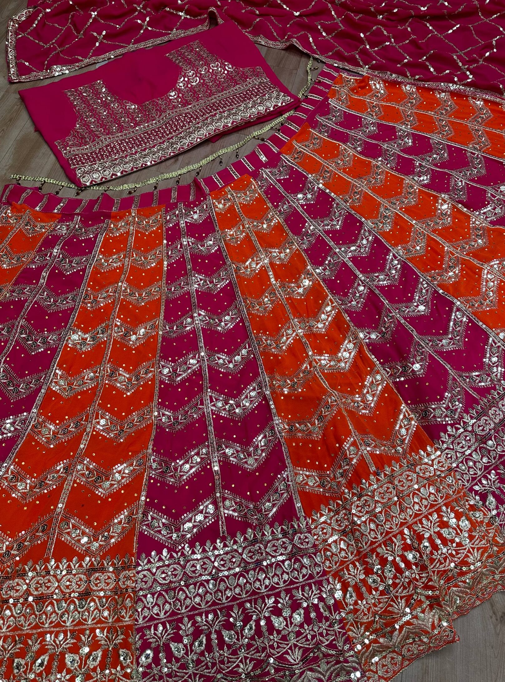 photo_1_2026-03-15_17-20-29 Designer Faux Georgette Lehenga Choli with Zari Sequins & Stone Work – Wedding Party Wear | RjPoshak